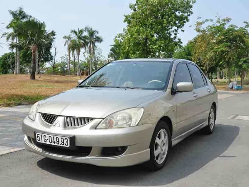 THAY Kính chắn gió xe Mitsubishi Lancer giá tốt